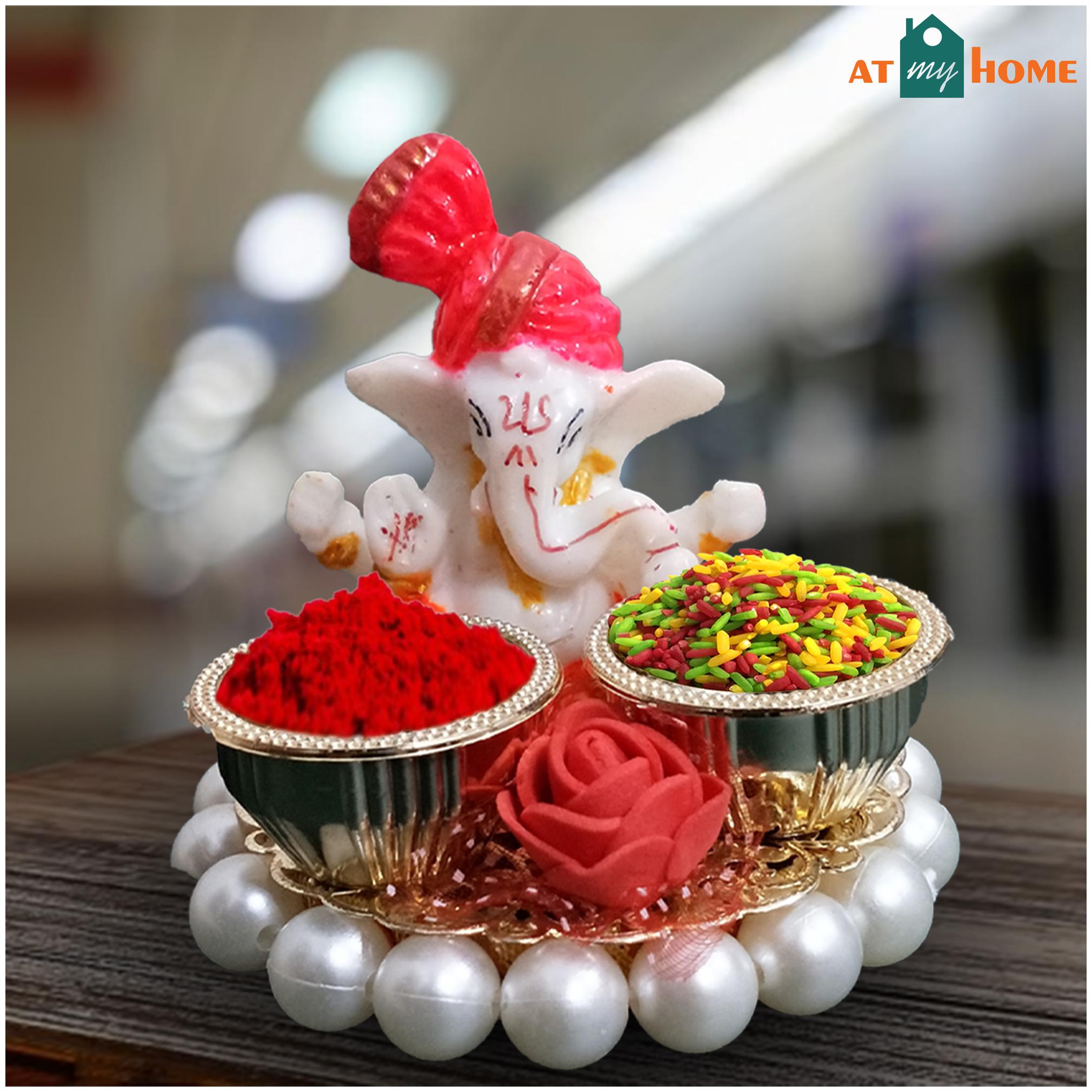 

Atmyhome Ganesha on Golden Haldi Kumkum Holder