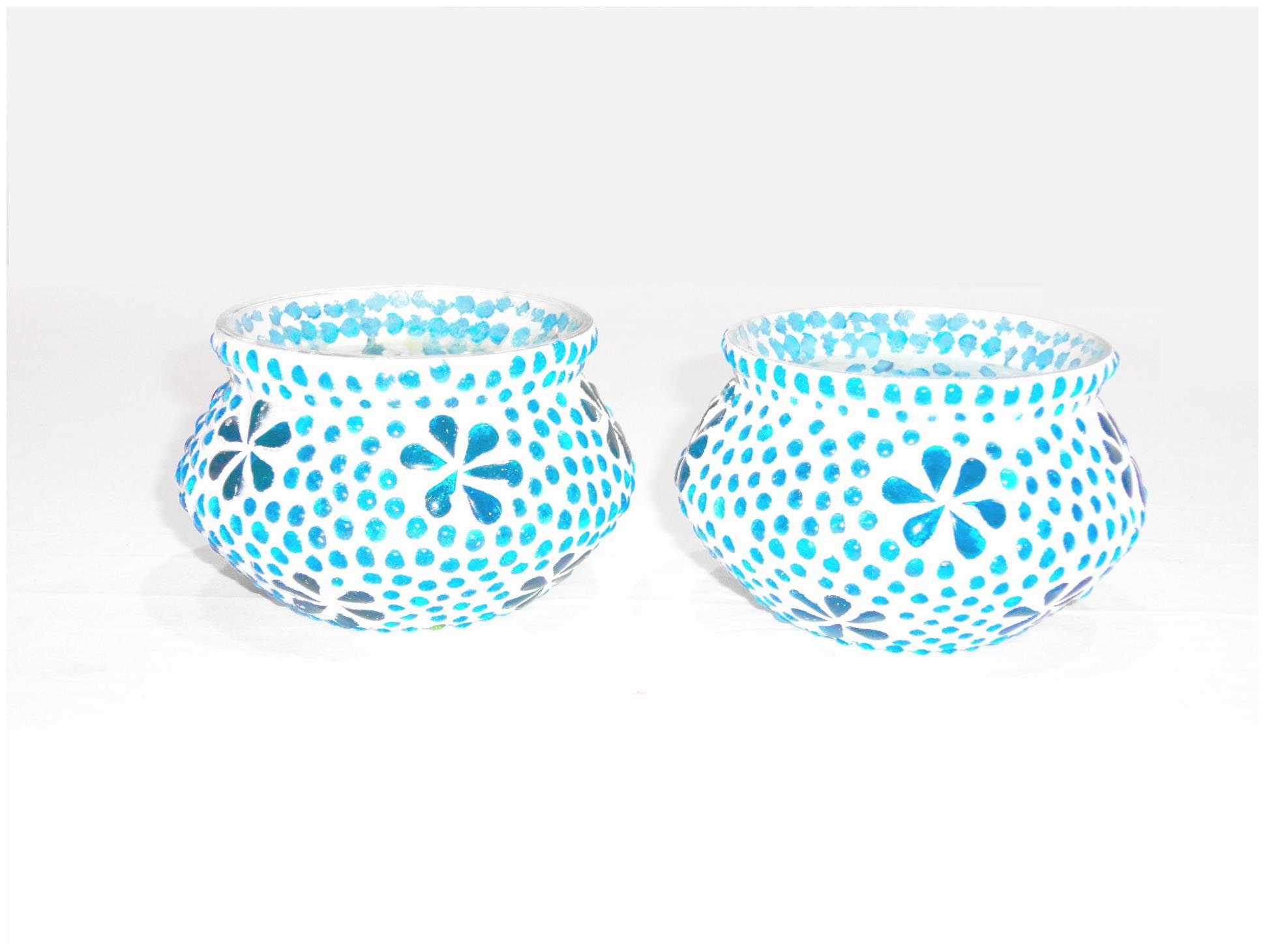 

Gupta Glass Exports Glass Blue Candle holder