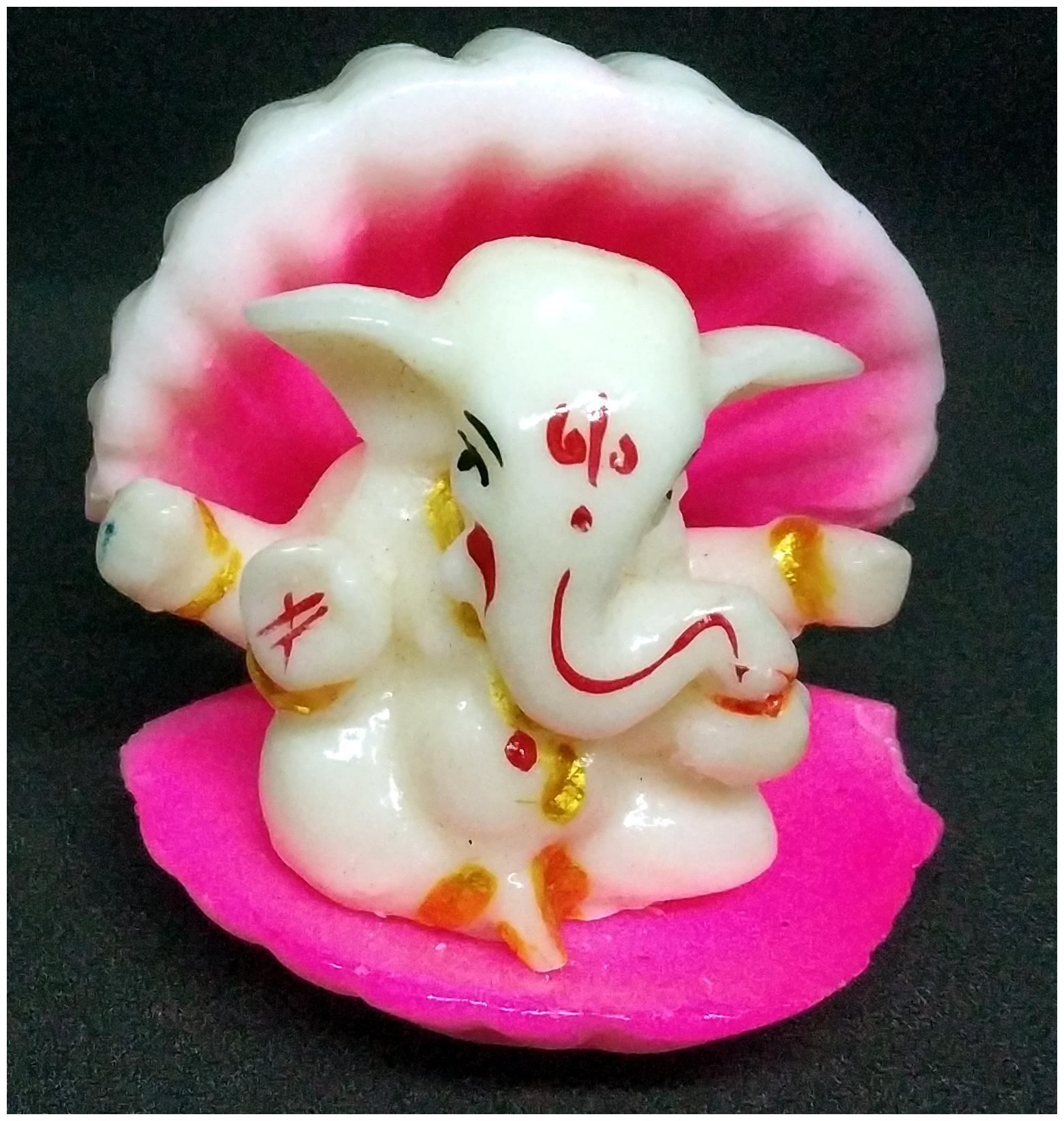 

Handicrafted Marble Look beautiful Hindu God Shri Ganesh under Shell Home Decorative Showpiece -5 cm (Polyresin)