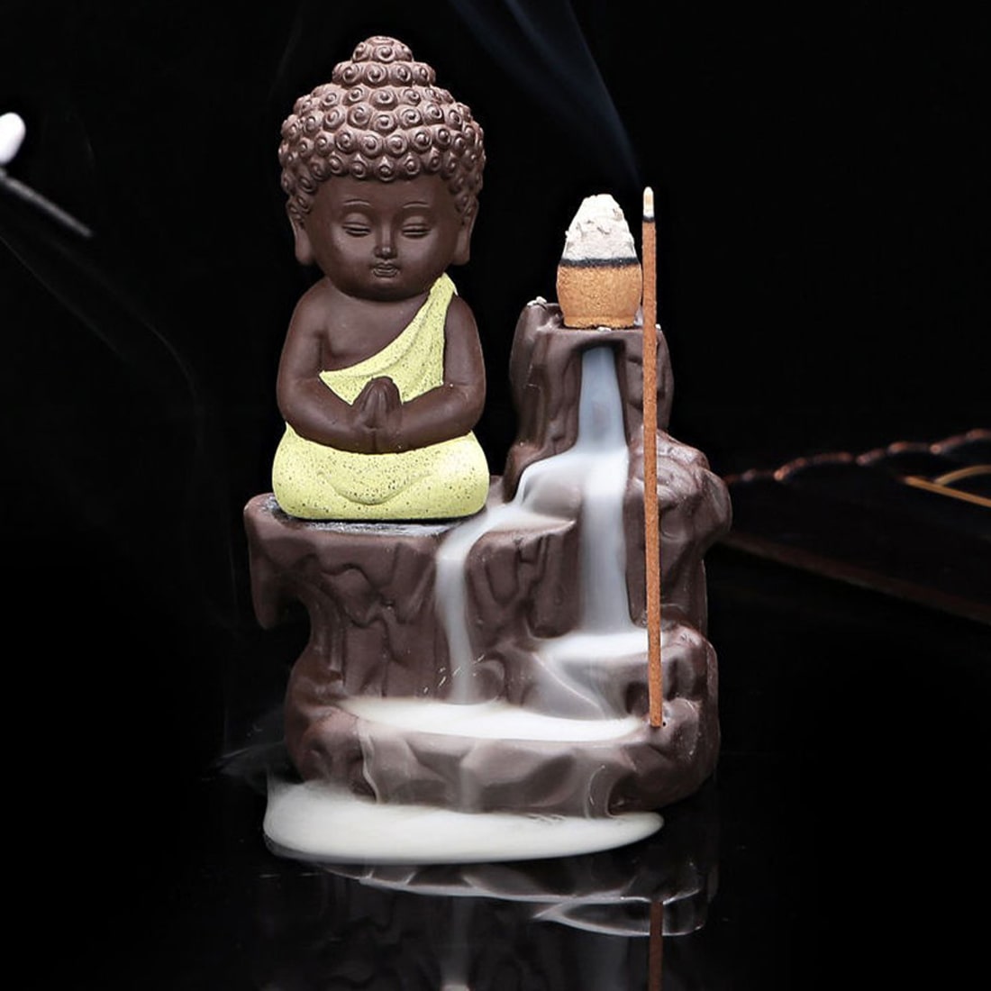 

BG BAZZAR gali Meditating Monk Buddha Smoke Backflow Incense Holder ( Random Color ) with 10 Incense Cones (B Y )