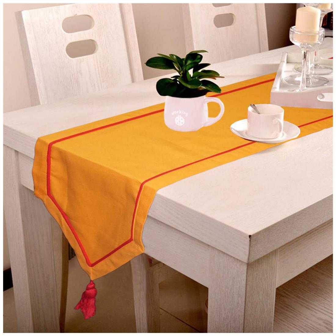 

Lushomes Orange Table Runner with Red contrasting cord piping