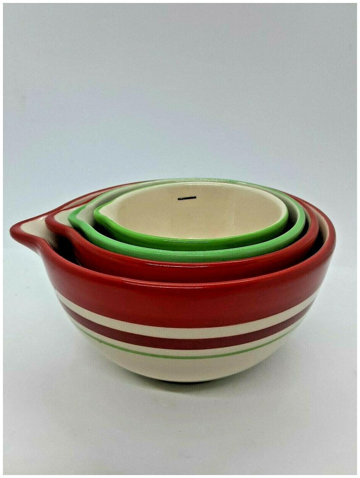 

NEW SET OF 4 1940 S REPLICA AT HOME AMERICA MULTI-COLOR MEASURING CUPS