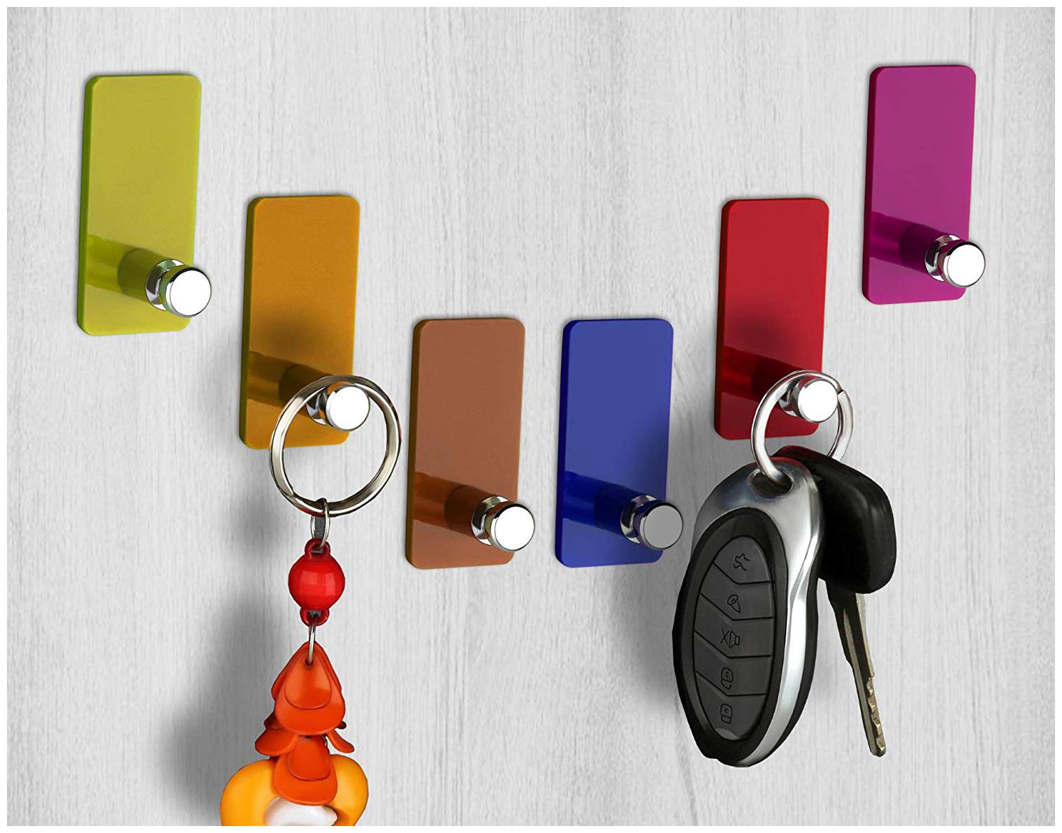 

OLIX Heavy Duty Adhesive Decorative Sticky Key Holder And Key Stand Hook Antic Key holder Plastic Key Holder (6 Hooks Multicolor)