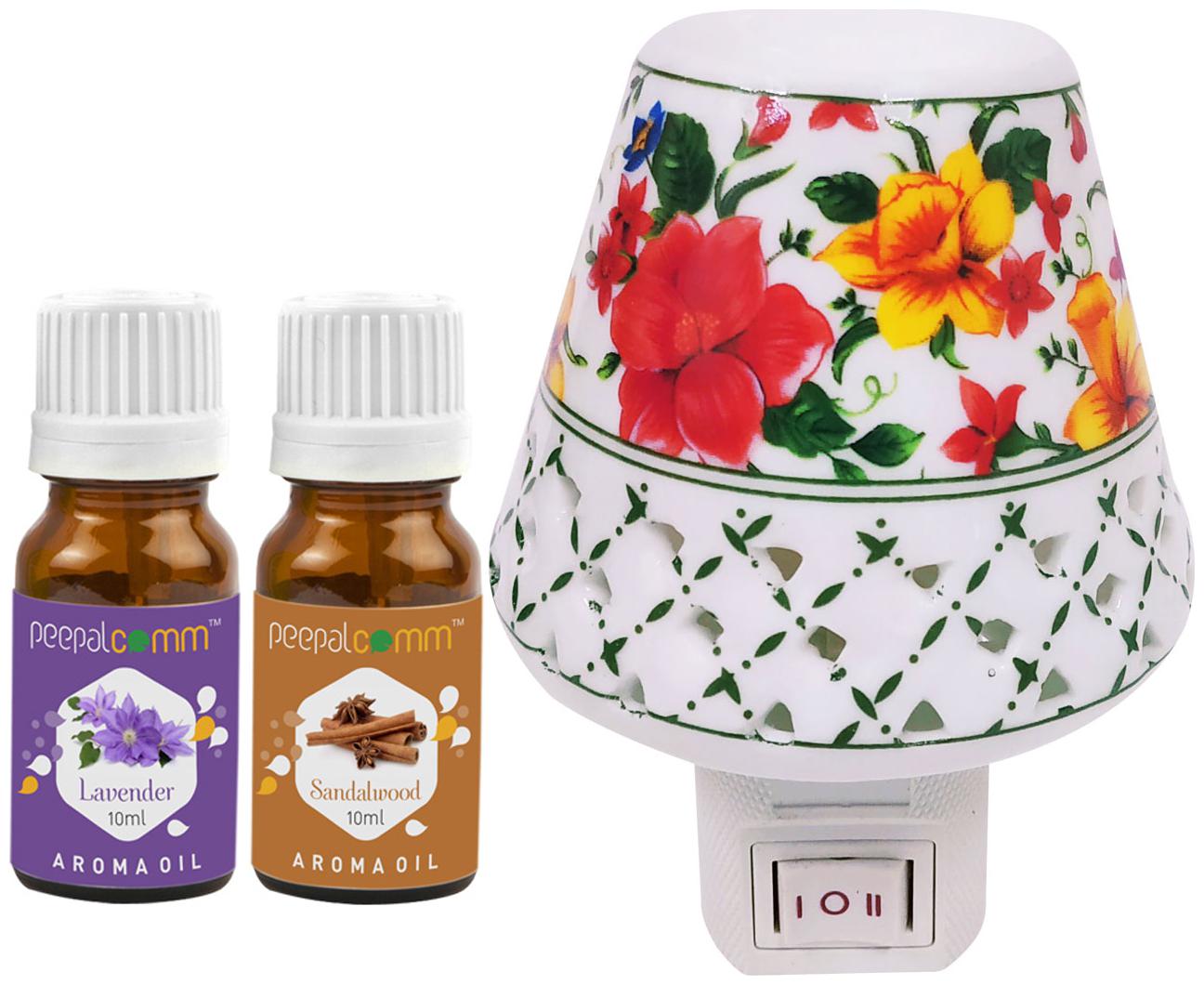 

PeepalComm Electric Ceramic Aroma Diffuser with Lavender Sadnalwood Aroma Oil 10ml each for office home Spa Pack of 3