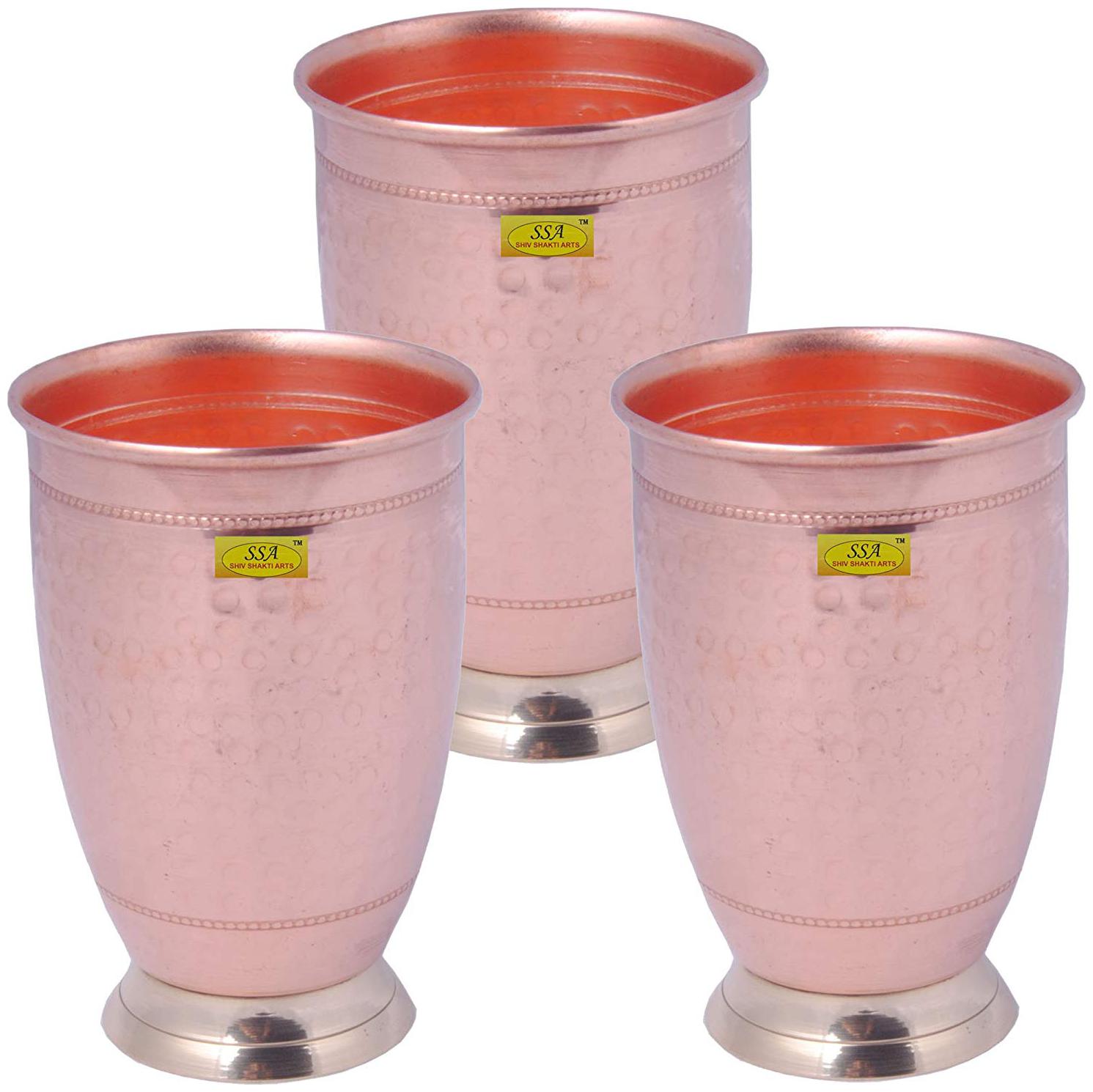 

Shiv Shakti Arts Set Of 3 14 cm X 8 cm Handmade Pure Copper Glass Tumbler Hammered Design With Brass Base Capacity 300 ml Each