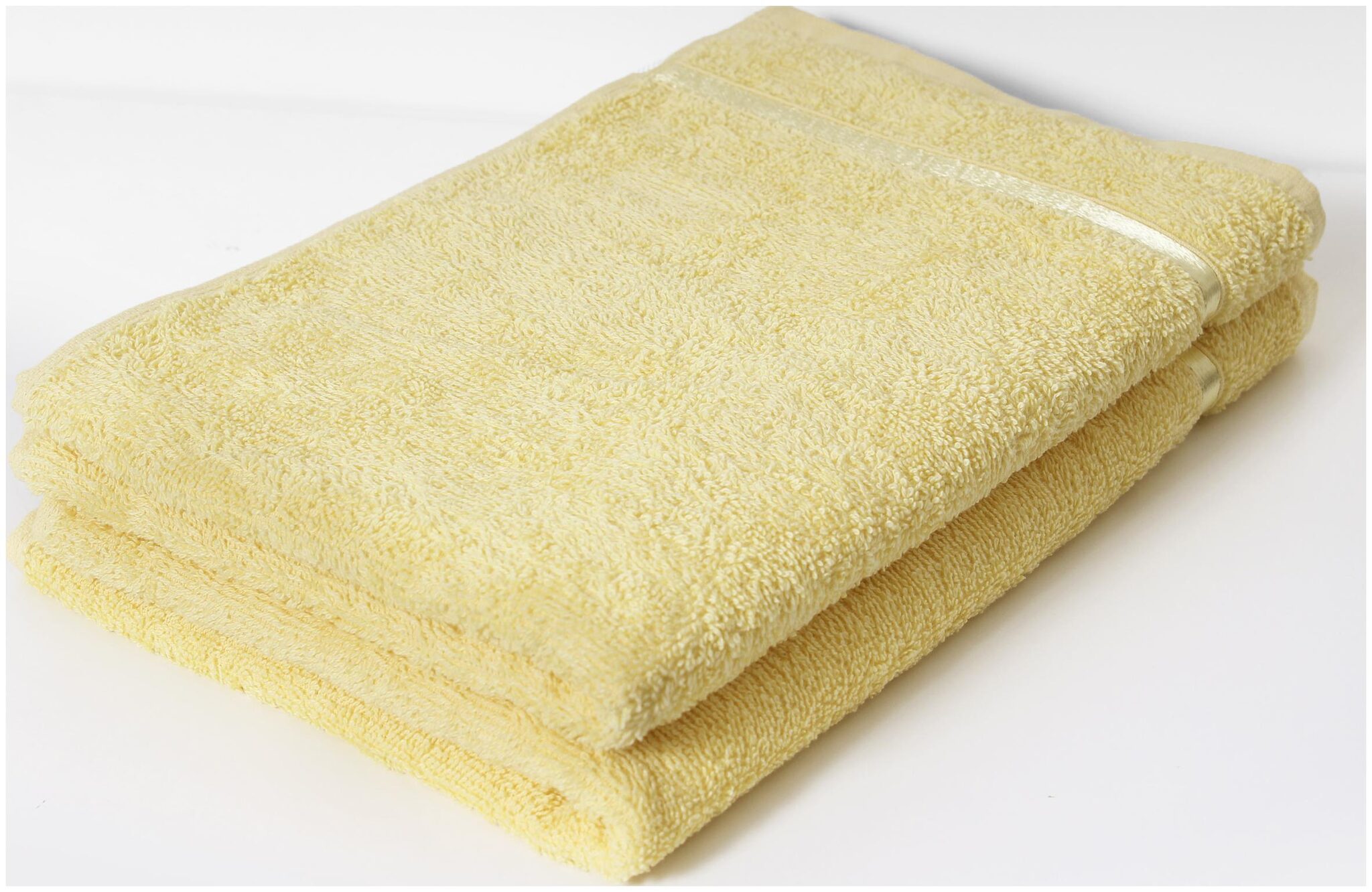 

Story Home 450 GSM Cotton Hand towel ( 2 pieces Yellow )