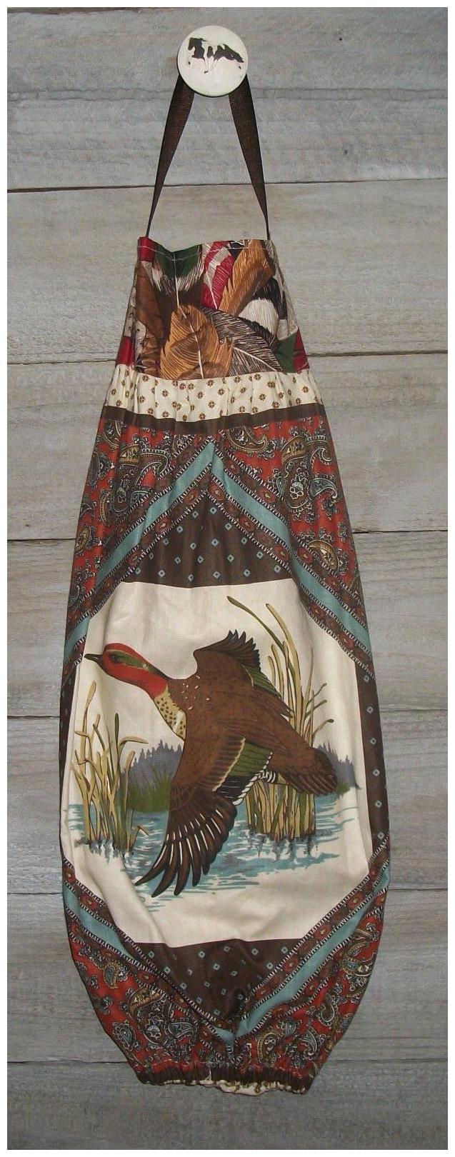 

Teal Duck in Flight Cattails Paisley Feathers Grocery Bag Rag Sock Holder
