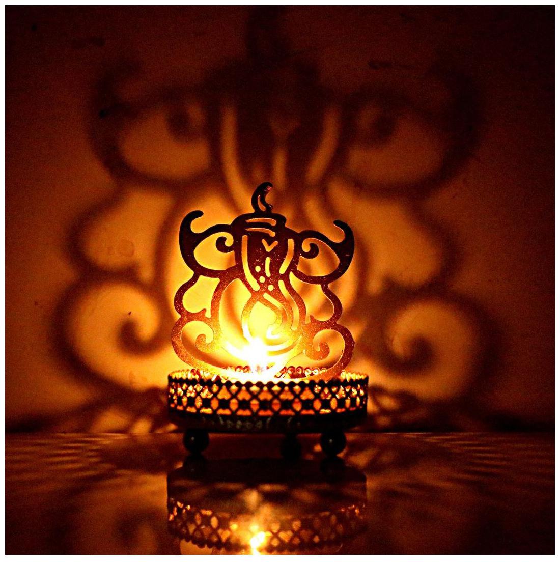 

Meenamart Metal Golden Candle