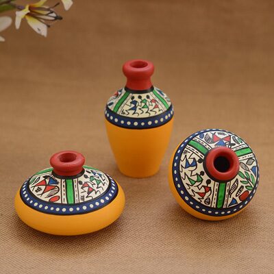 

Unravel India Teracotta Yellow Warli Handpainted Decorative Pot (Set Of 3)