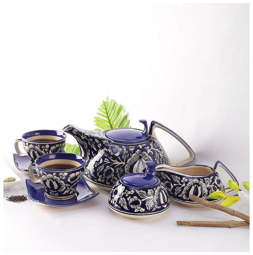 

Unravel India Ceramic Mughal Handpainted Blue Tea Set (15 pcs )