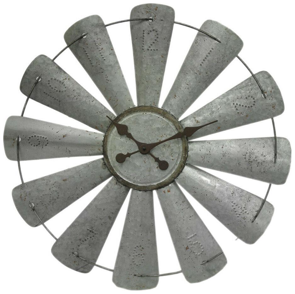 

Zeckos Galvanized Grey 26 inch Rustic Metal Windmill Wall Clock