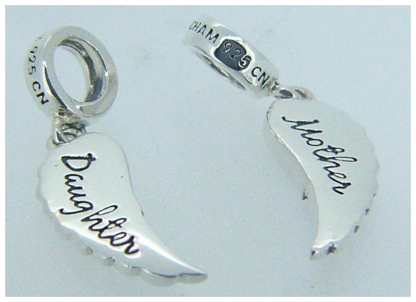 

2025-2468 CHAMILIA STERLING SILVER MOTHER DAUGHTER ANGEL WINGS 2 BEADS IN BOX