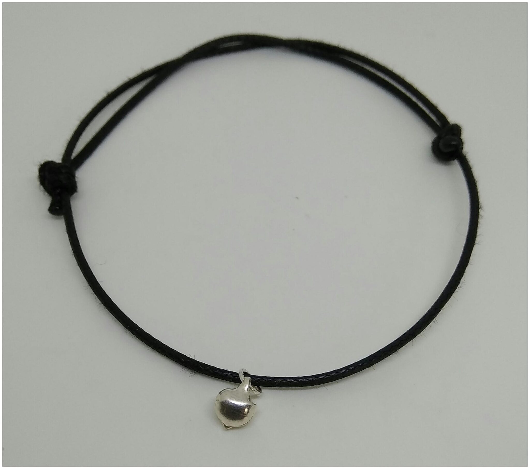 

Adjustable knot black rope anklet with silver ghungroo bead