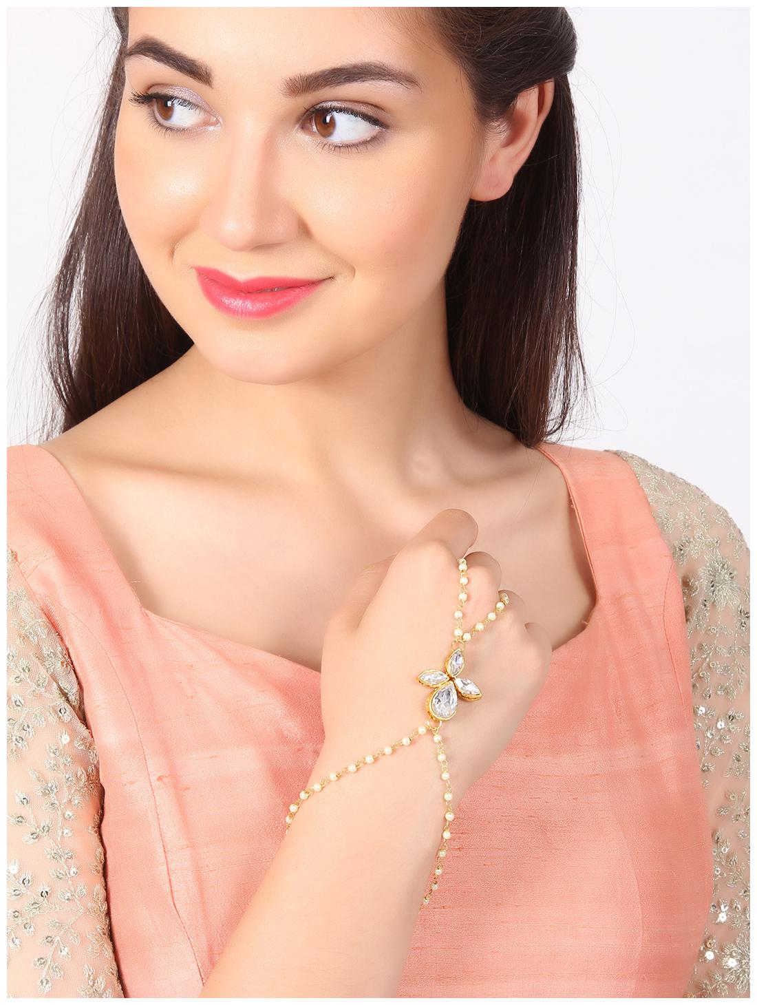 

Ankur relish gold plated kundan and pearl beads ring bracelet for women