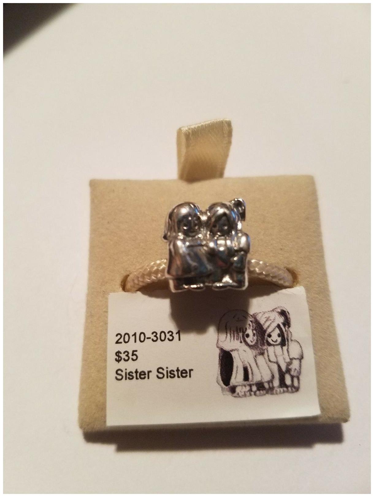 

Authentic Chamilia Sister Sister Charm