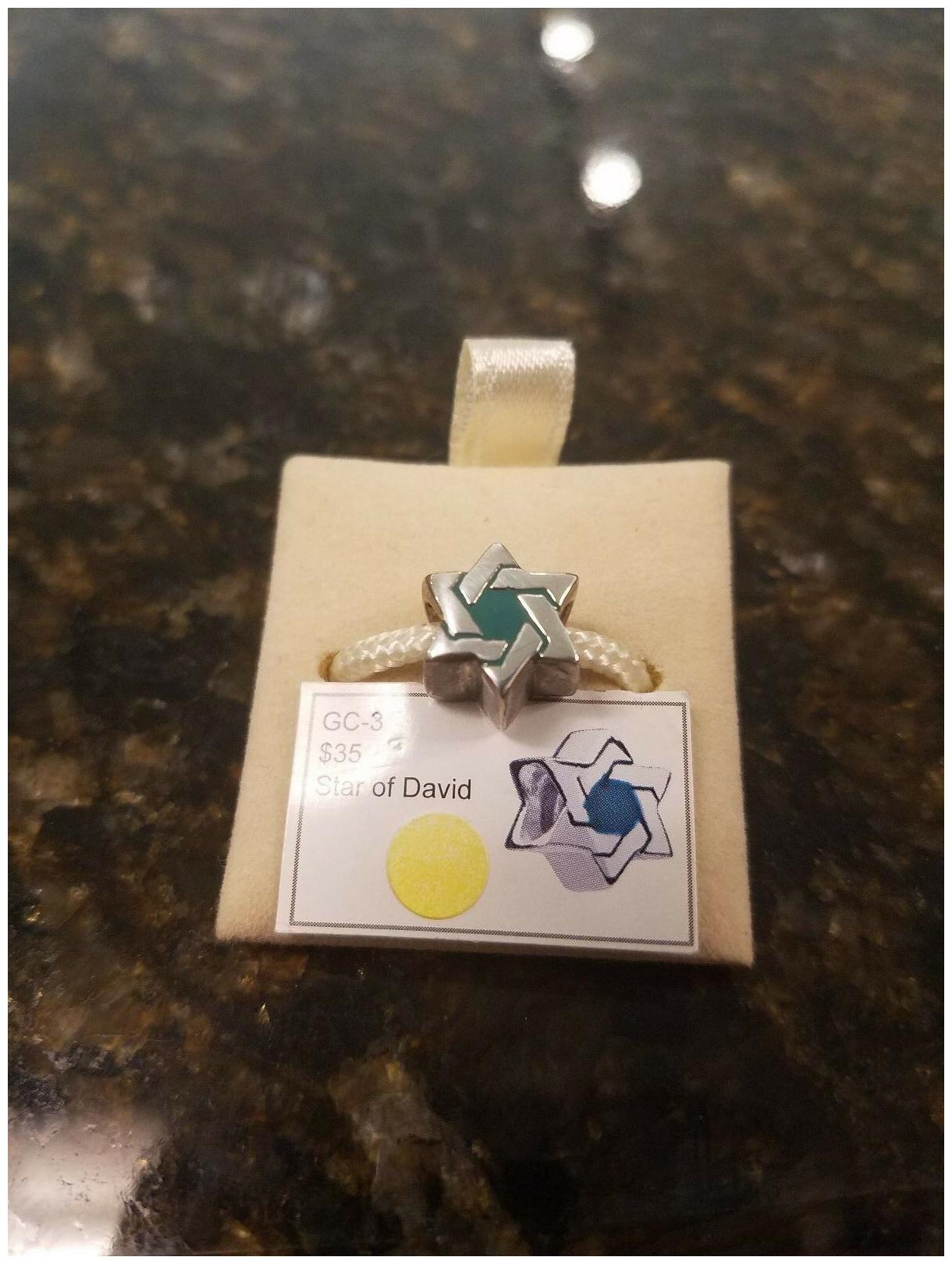 

Authentic Chamilia Star of David Charm