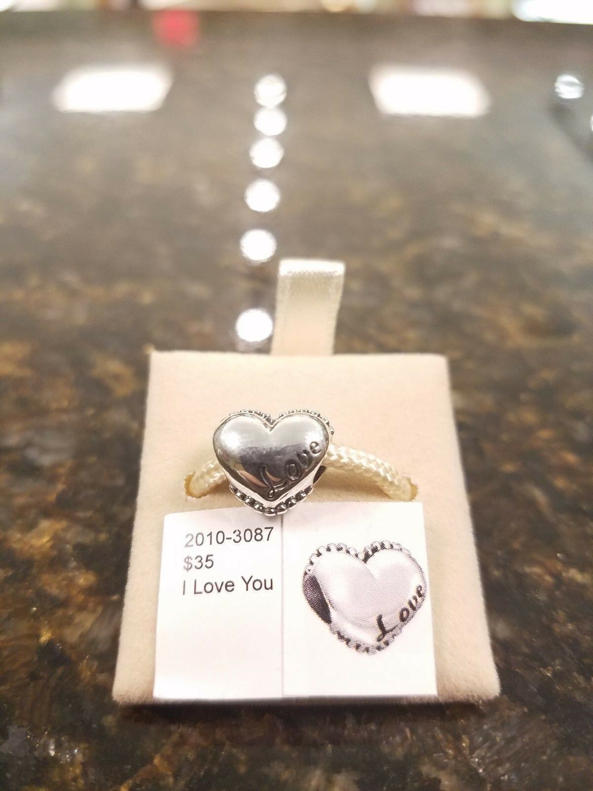 

Authentic Chamilia I Love You Charm