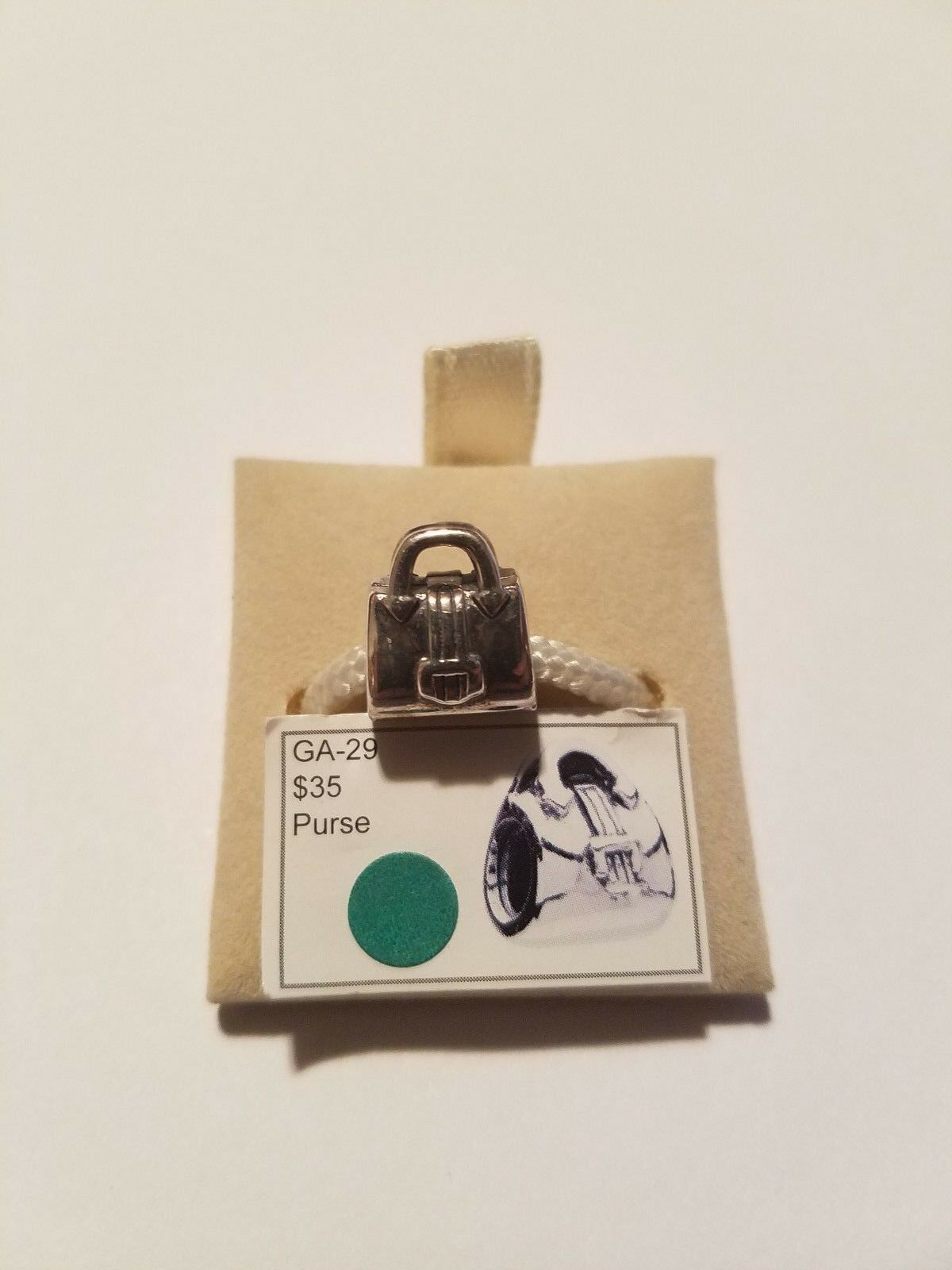 

Authentic Chamilia Purse Charm