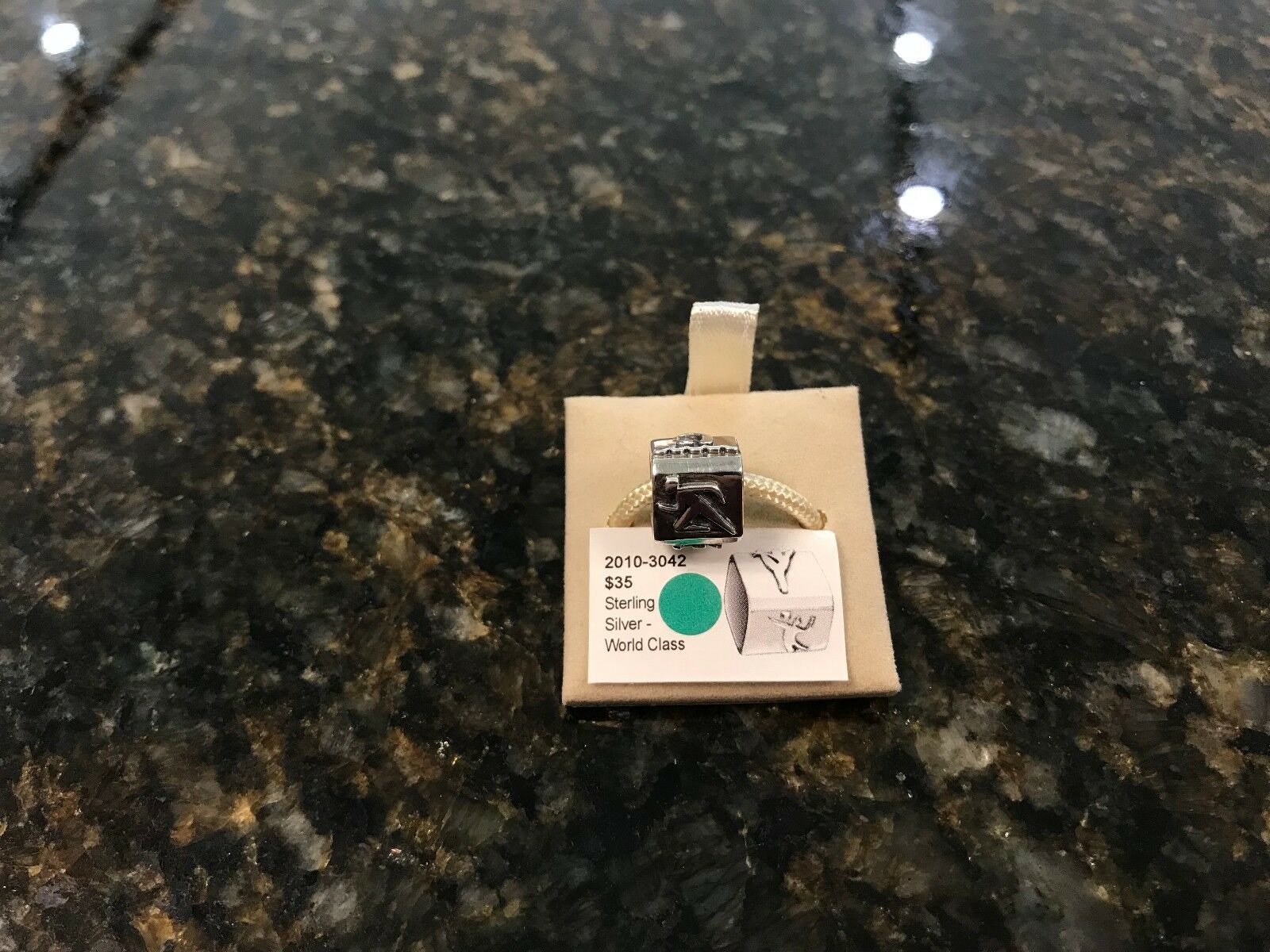 

Authentic Chamilia Sterling Silver World Class Charm