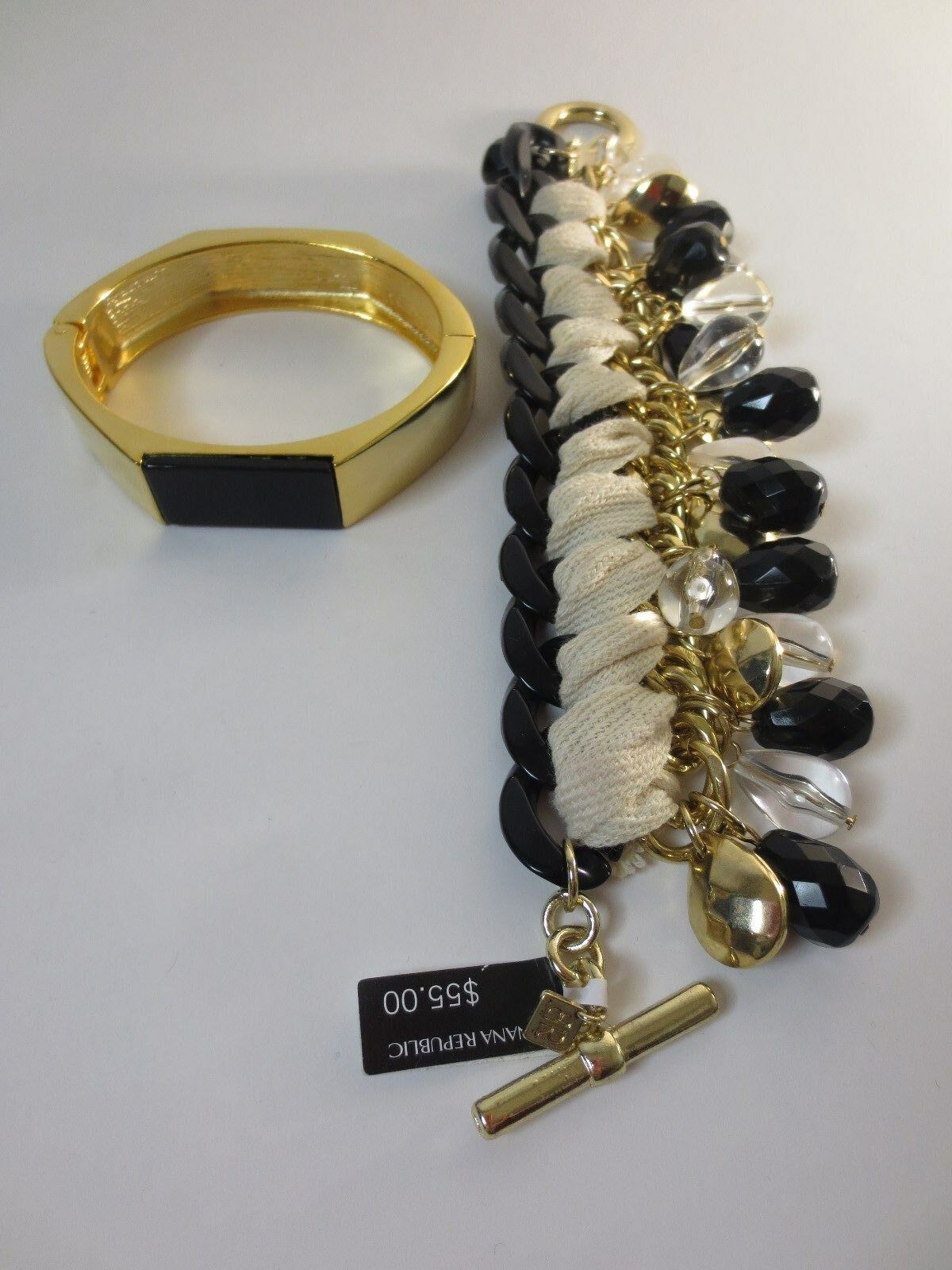

Banana Republic Charm ToggleBracelet NWT 55 00 Black Bar Cuff Bracelet NWOT 49