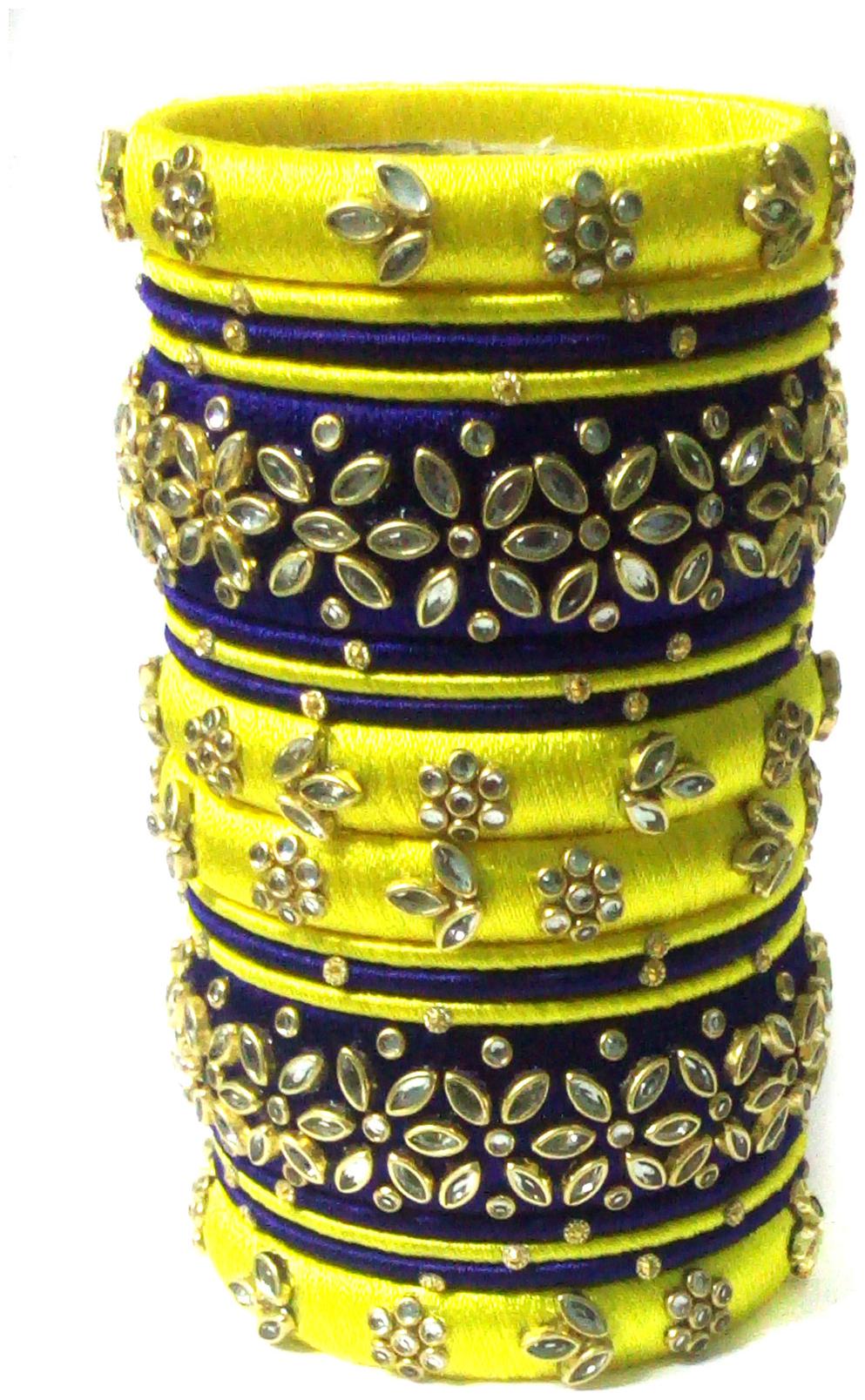 

Blue jays hub silk thread bangles yellow and navy color set of 18
