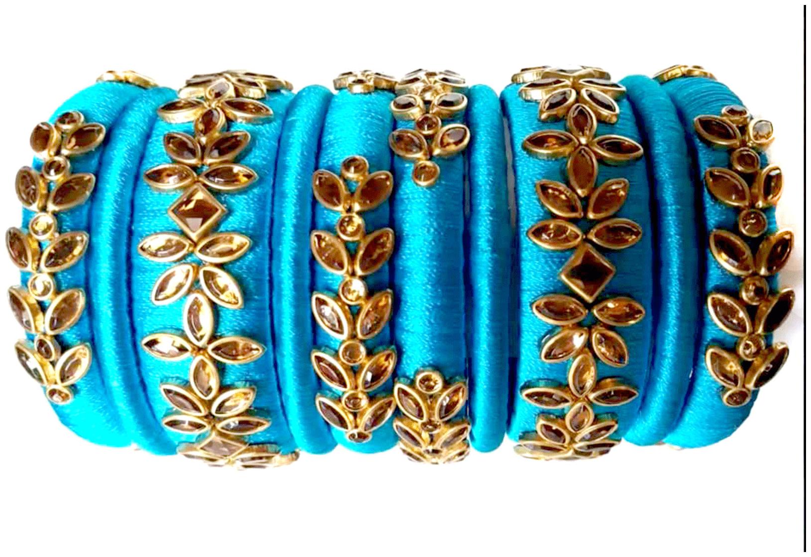 

Blue jays hub silk thread bangles light blue color set of 10