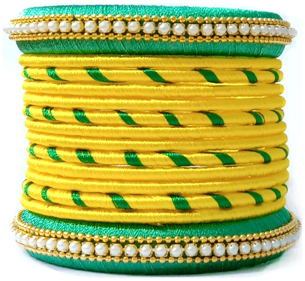 

Blue jays hub silk thread bangles set of 14 yellow and light green color