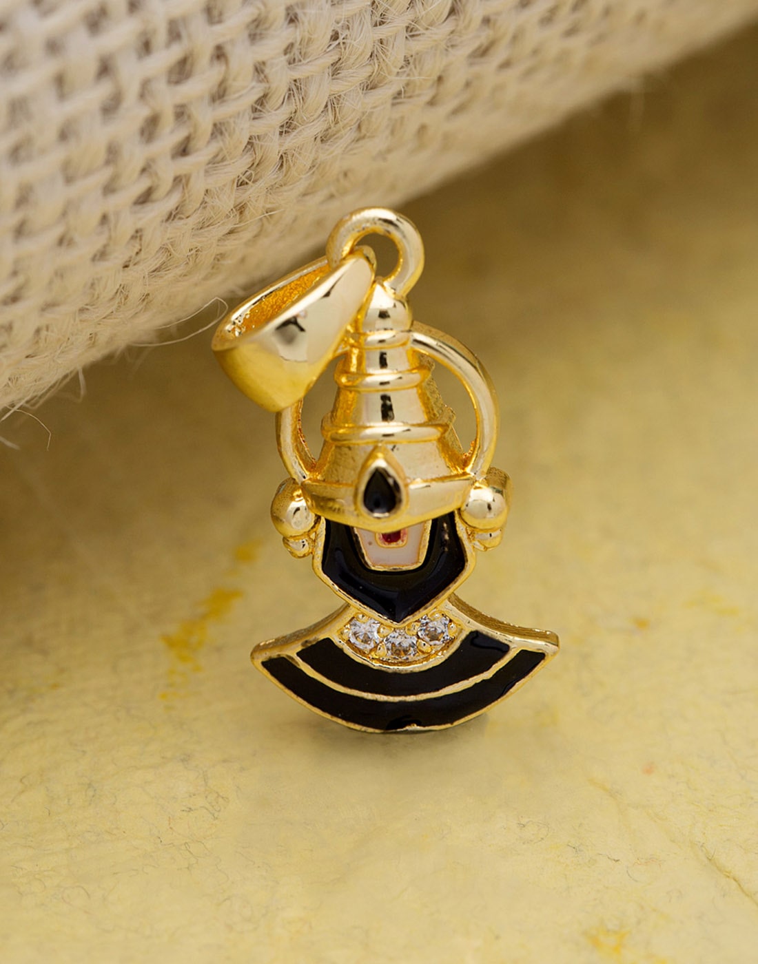 

Dare by Voylla Spiritual Saga Black Enamel Tirupati Pendant