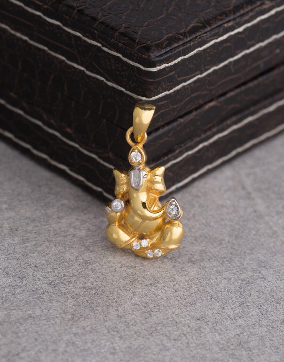 

Dare by Voylla Dual Tone Lord Ganpati Pendant from Spiritual Saga