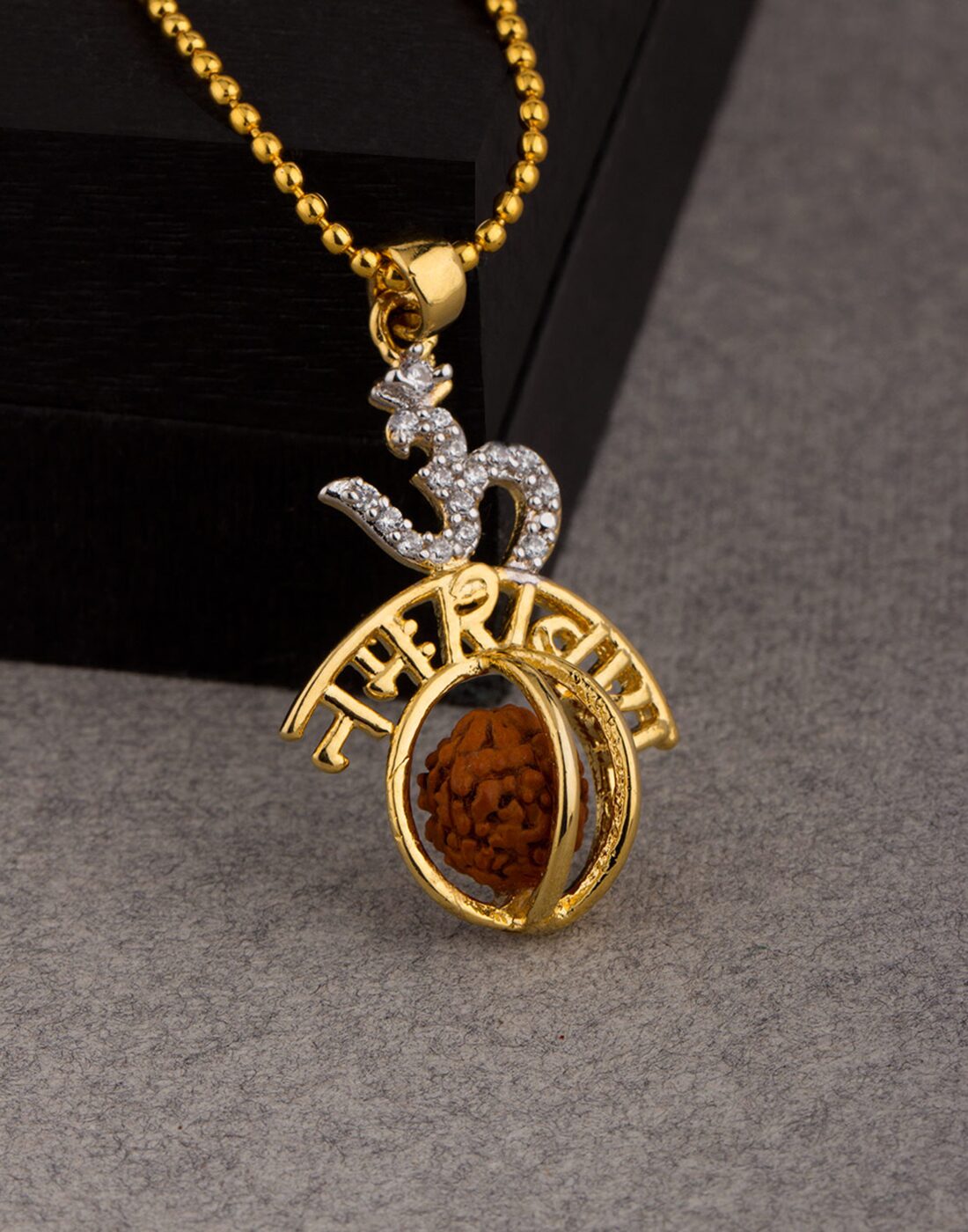 

Dare by Voylla OM Namah Shivay Rudraksha Studded Pendant With Chain For Men