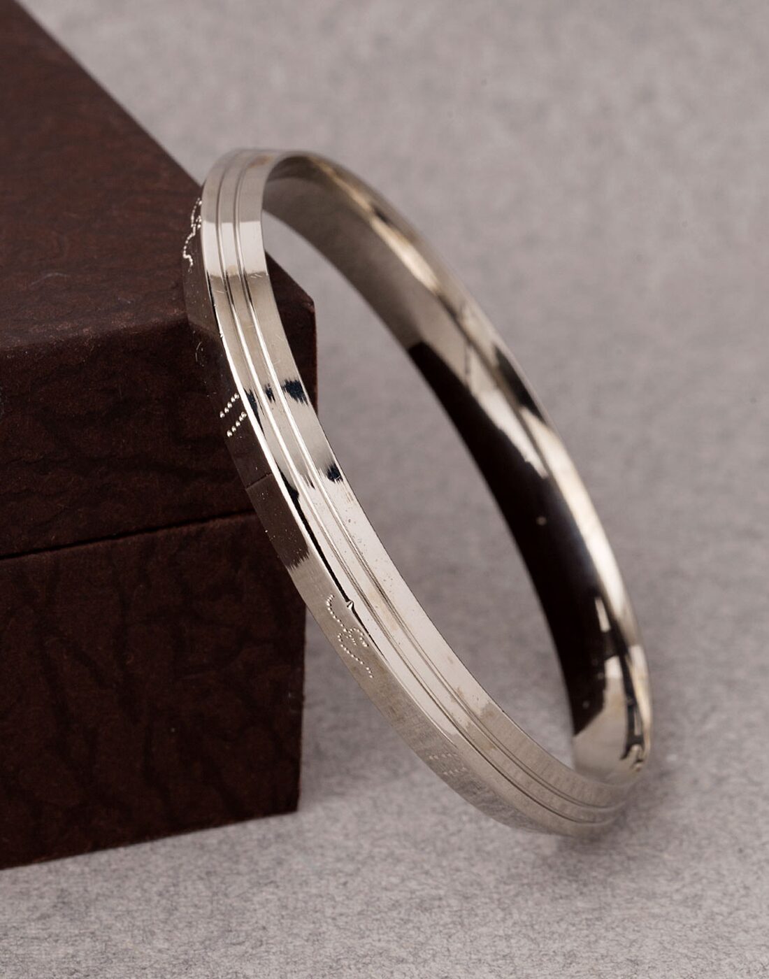 

Dare by Voylla Silver-Plated OM Engraved Spunk Kada