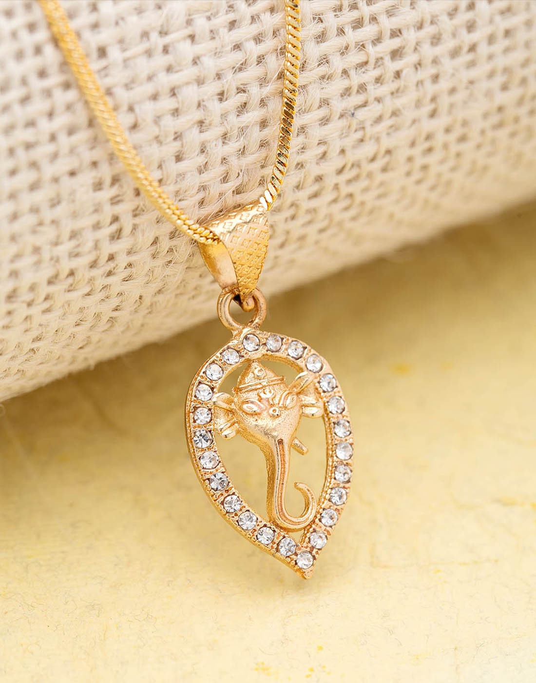 

Dare by Voylla Gem Studded Ganesha Pendant with Gold Plating