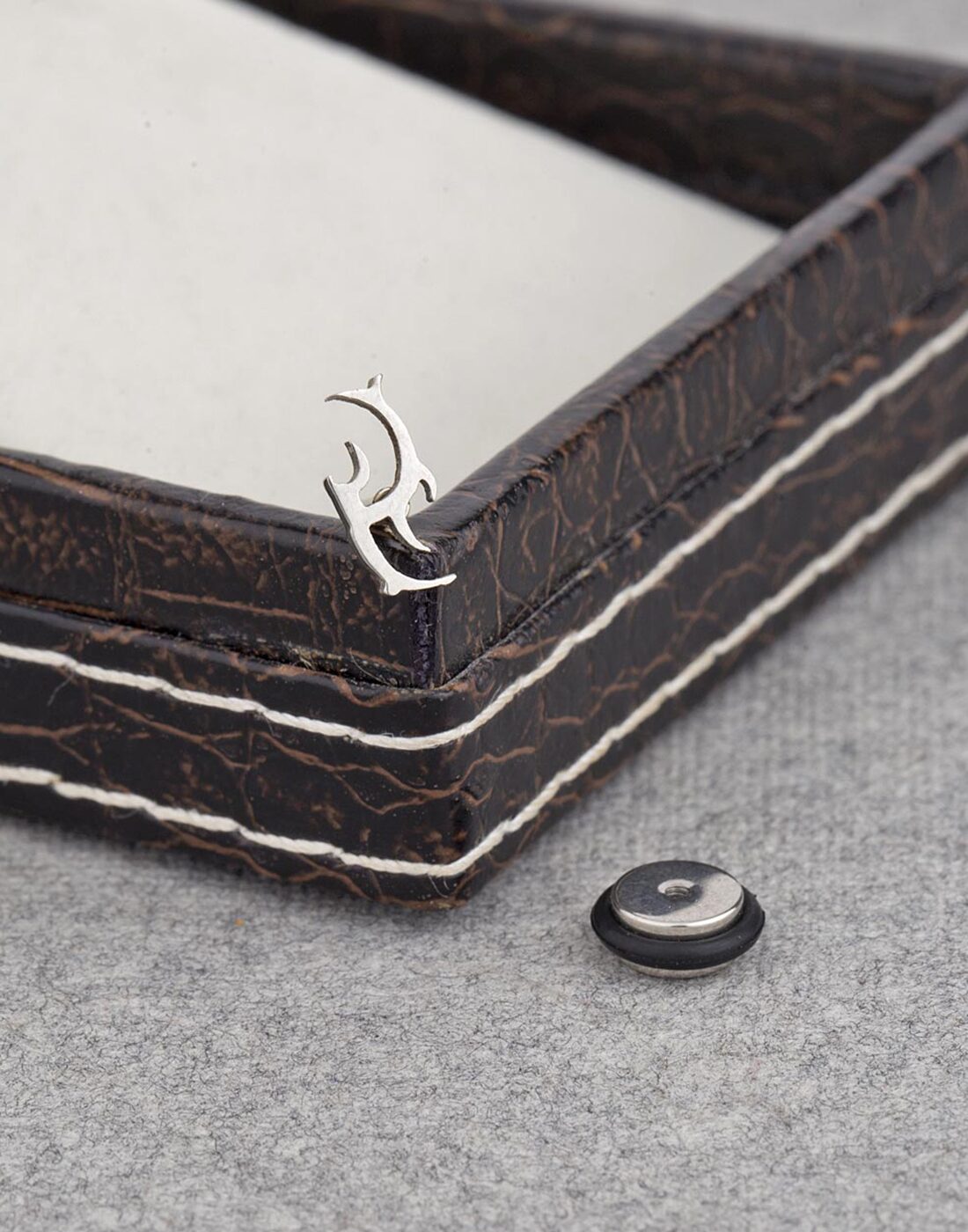 

Dare by Voylla Dolphin Stud from the Stud Out Collection