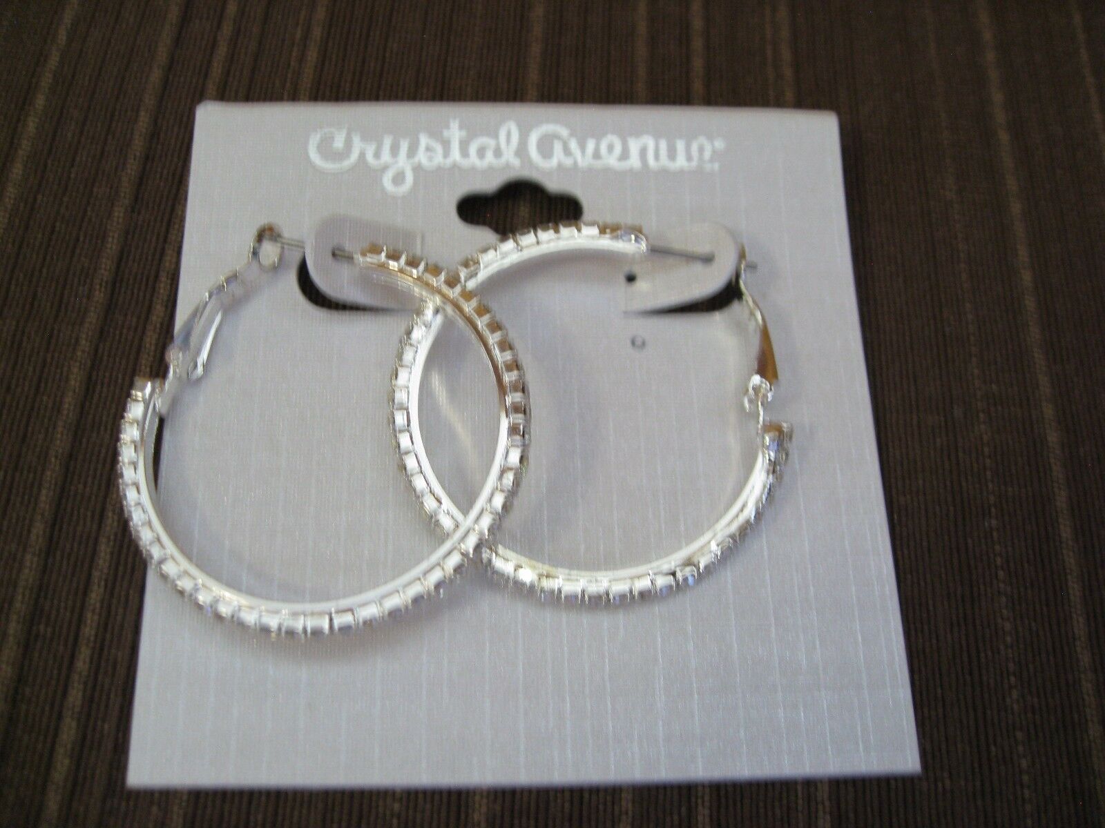 

HOOP PIERCED EARRINGS SILVER TONED METAL AND CLEAR CRYSTAL INLAID 20983