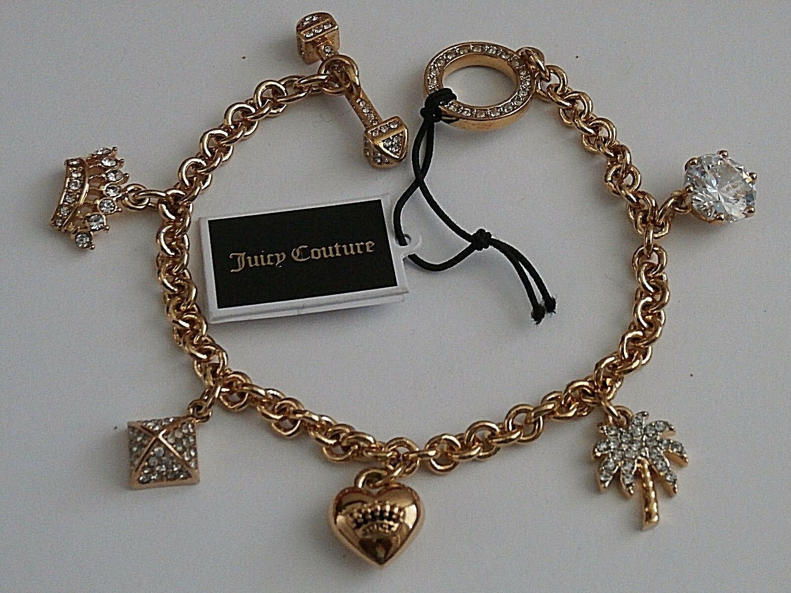 

JUICY COUTURE MULTI CHARM CHARM BRACELET CROWN PYRAMID PUFF HEART PALM STONE