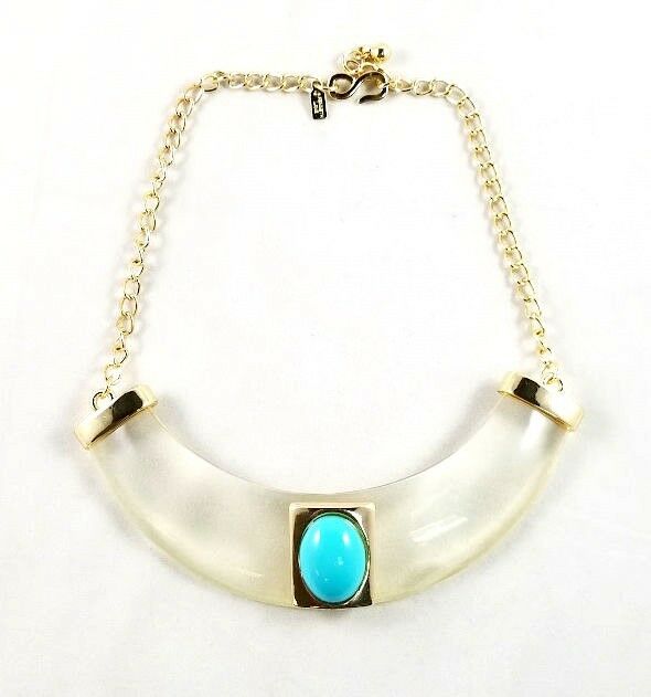 

Kenneth Jay Lane gold chain clear blue center stone bib necklace