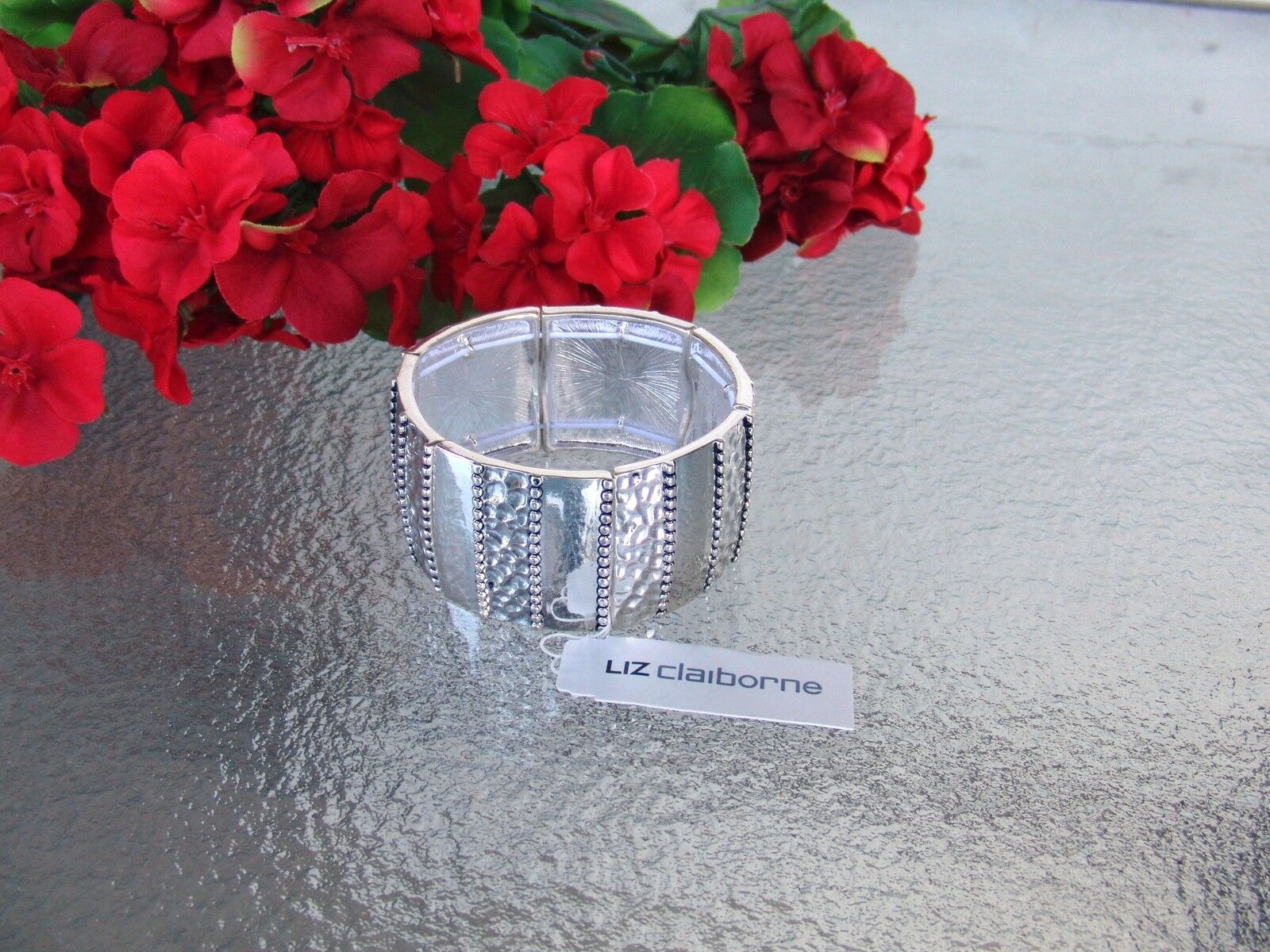 

Liz Claiborne High Polished Silvertone Cuff Stretch Bracelet New With Tag