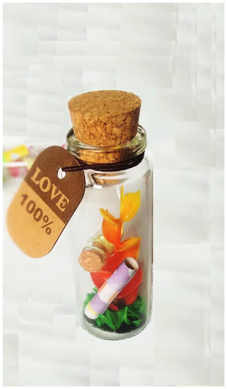 

Message Bottle With Quotes flowers and Band Inside
