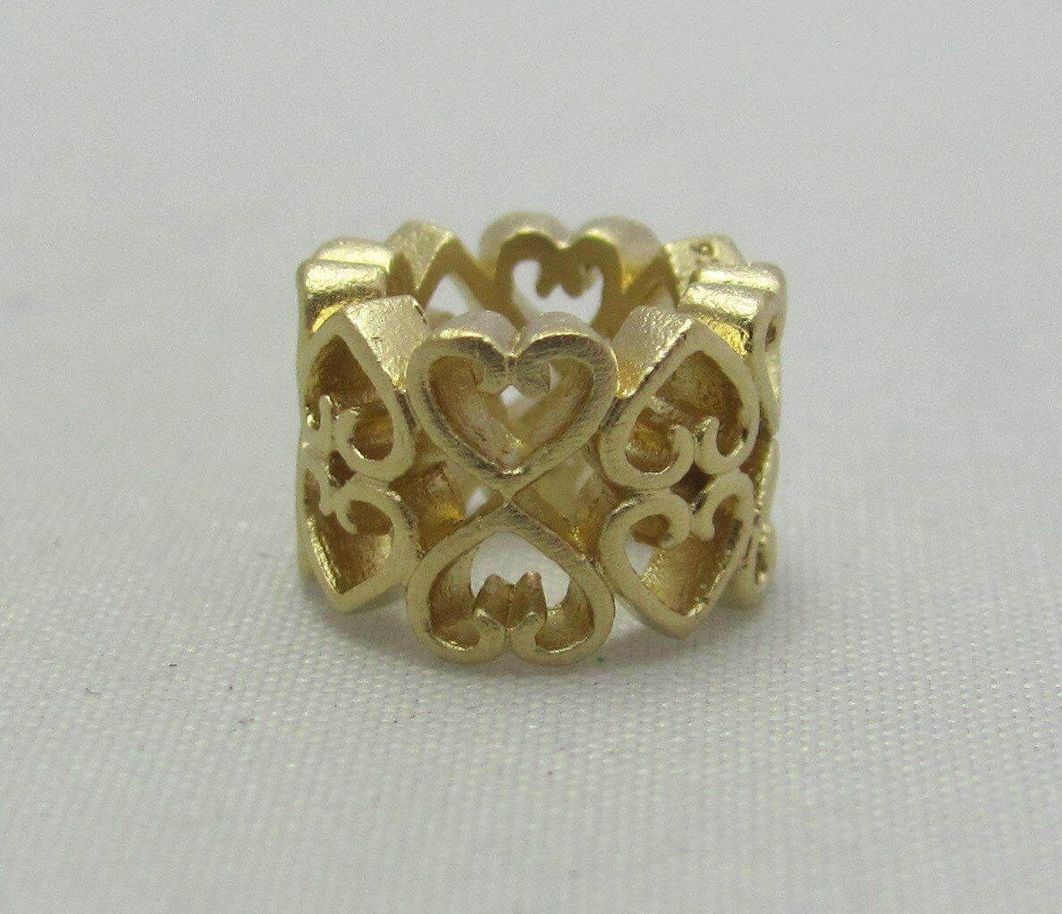 

New Authentic Endless Million Spring Love 925 Yellow Gold Plated Charm 51330