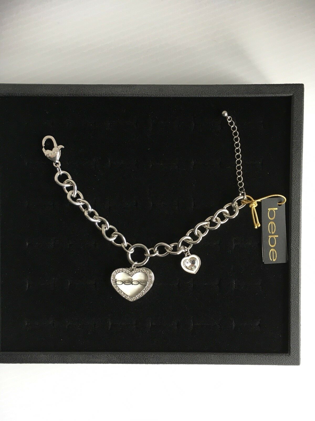 

NEW Bebe BRACELET SILVER TONE HEARTS RHINESTONES