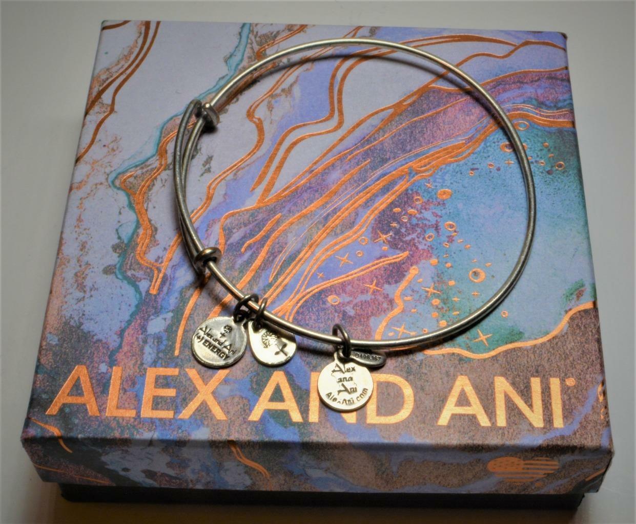 

New Box ALEX ANI Silvertone Dangle Charms ENERGY 3 Expandable Bracelet