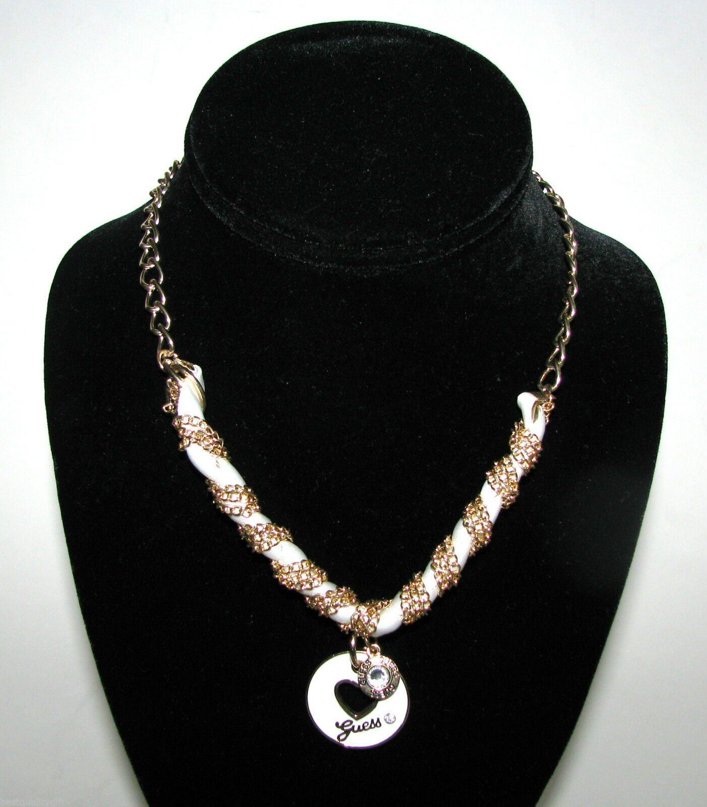 

NEW-GUESS GOLD TONE NECKLACE w RHINESTONE WHITE RIBBON ROUND HEART LOGO CHARM