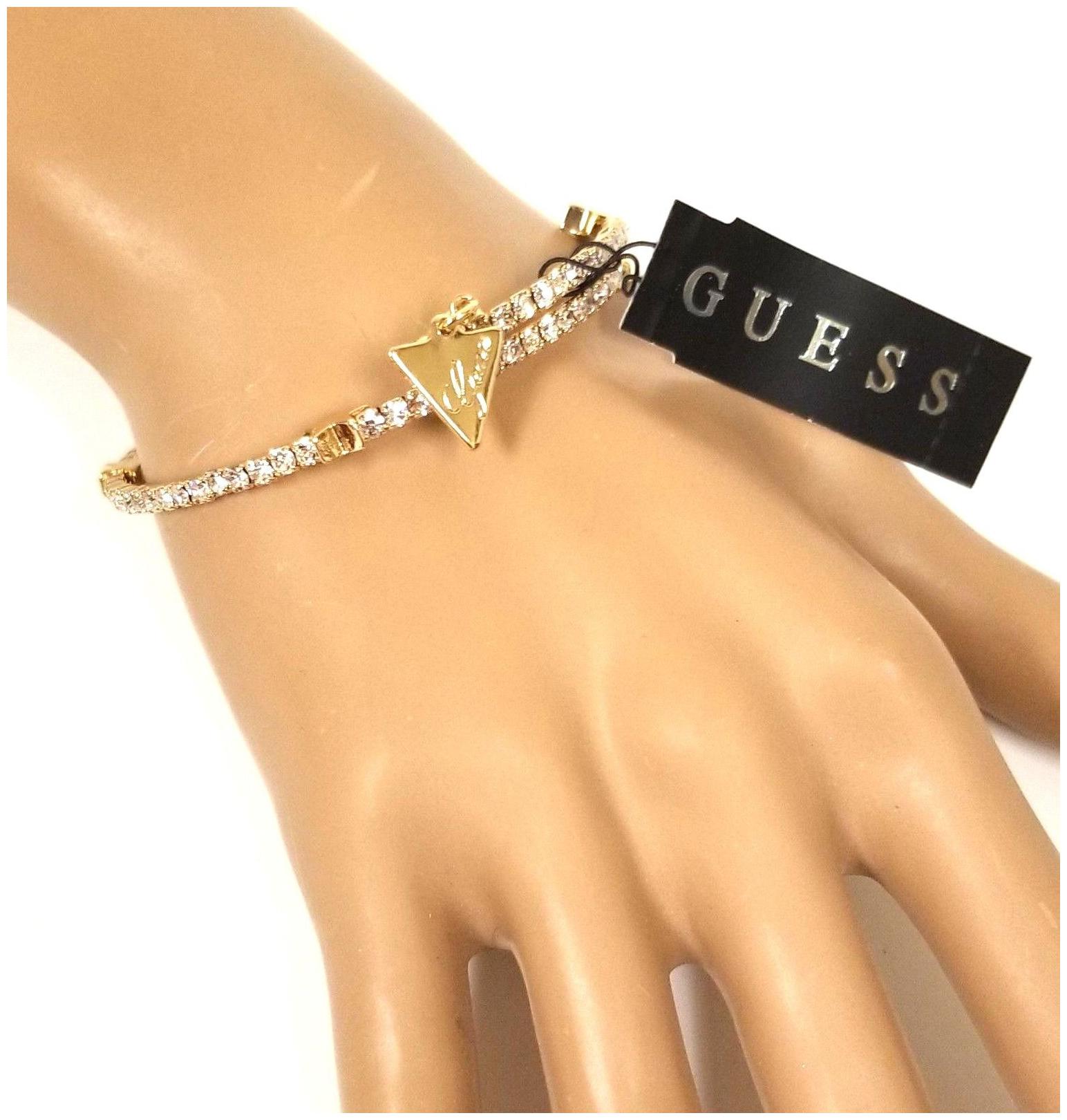 

NEW GUESS GOLD TONE THIN CRYSTALS FLEXIBLE CUFF BRACELET STARS TRIANGLE CHARM