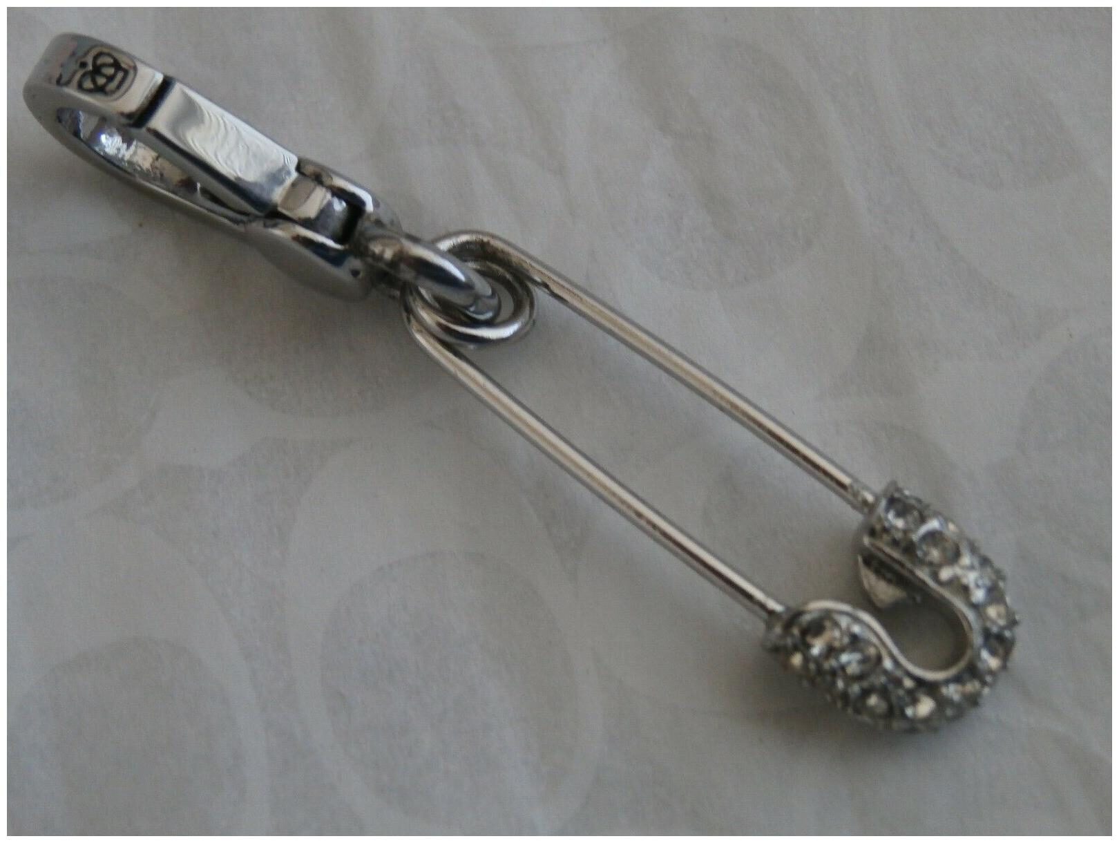 

NEW NEVER USED JUICY COUTURE PAVE SAFETY PIN SILVER CHARM WITH BOX RETIRED