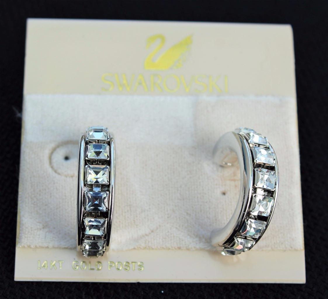 

New on Card Signed SWAROVSKI Silvertone Clear Crystal Pierced Earrings