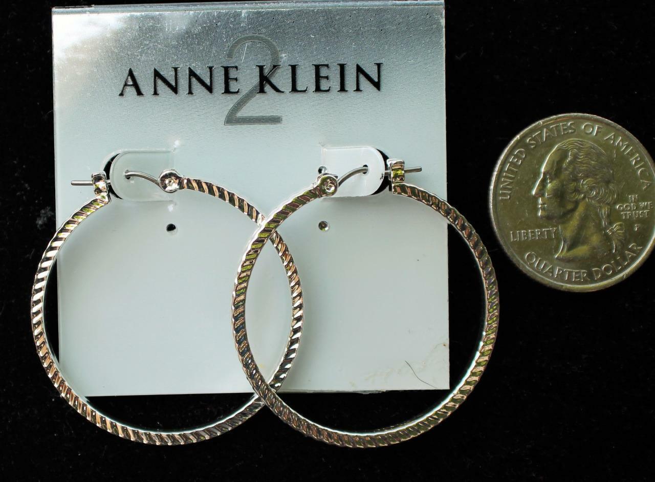 

New Original Card Old Stock ANNE KLEIN Silvertone HOOP Shape Pierced Earrings