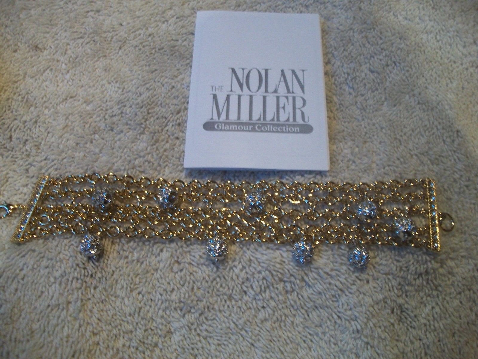 

NOLAN MILLER Bracelet Alluring Multi Chain Goldtone with Austrian Crystal Balls