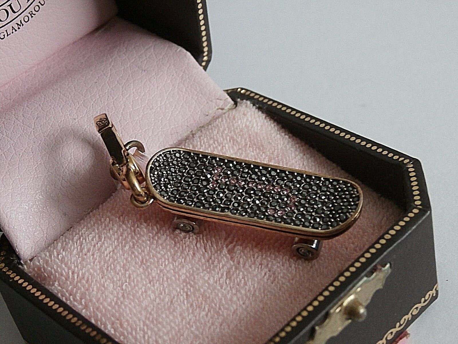 

NWT JUICY COUTURE NEVER USED PAVE SKATEBOARD GOLD CHARM WITH BOX RETIRED