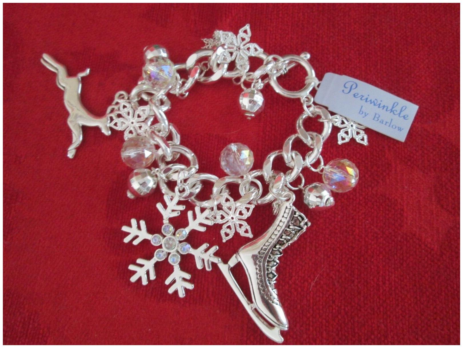 

NWT Periwinkle by Barlow Charm Bracelet with Snowflakes Skates Reindeer Charms