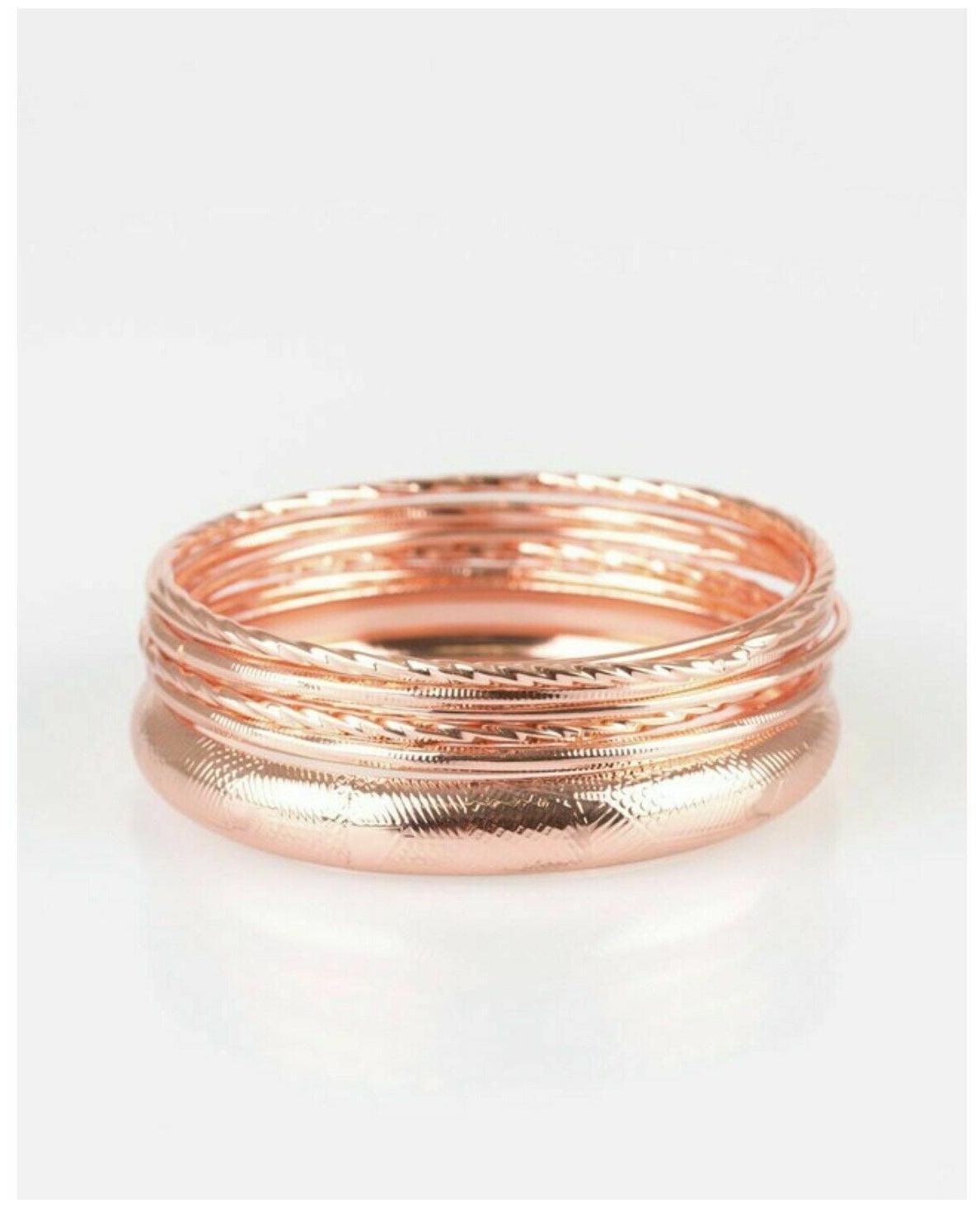 

PAPARAZZI THE CUSTOMER IS ALWAYS BRIGHT COPPER MISMATCHED ETCHED STACKED BANGLE